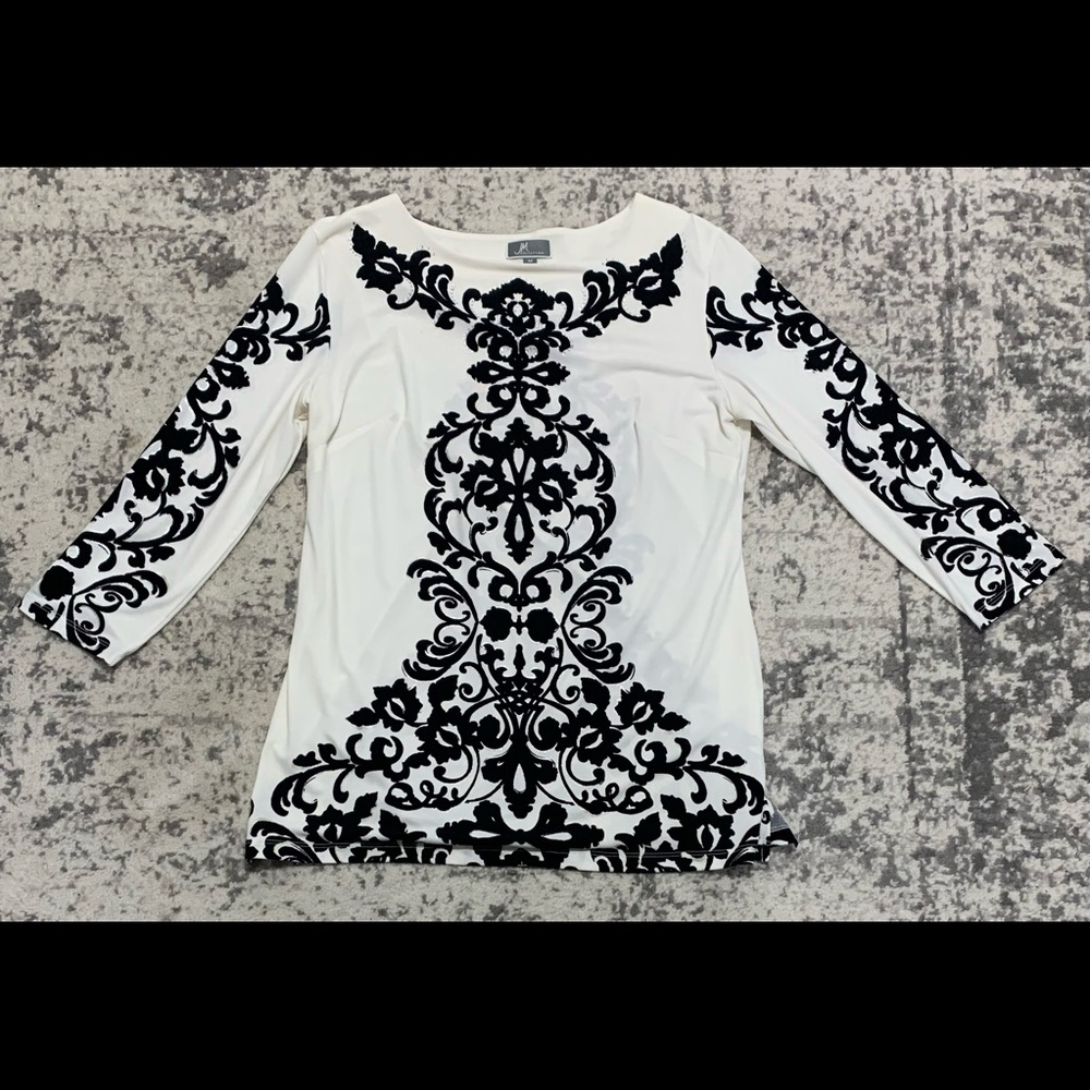 Beautiful white and black blouse.